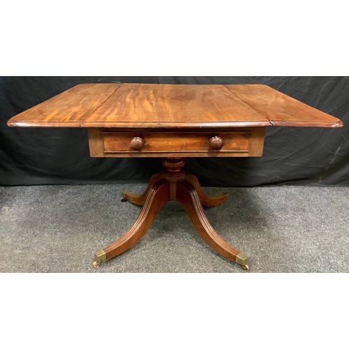 125 - A 19th century mahogany Pembroke table, rounded rectangular top with fall leaves above two frieze dr... 