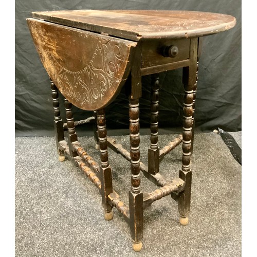 135 - A 19th century 17th century style oak drop-leaf table, oval carved top, bobbing turned supports, 73c... 