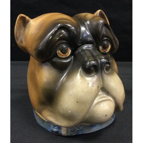 151 - An early 20th century continental tobacco jar and cover in the form of a Bull dog head; a pair of ea... 