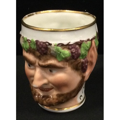 181 - An early 19th century Derby type Young Bacchus cup, moulded with grape and vine chaplet, loop handle... 