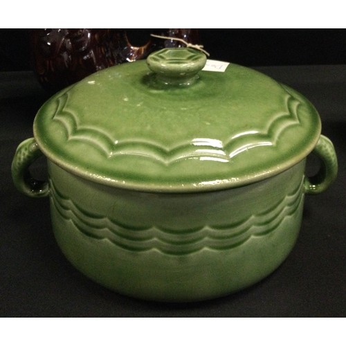 192 - A Denby 'Epic' pattern tureen with cover, green glaze, fish handles, 1930-1940; an Arthur Wood Fish-... 