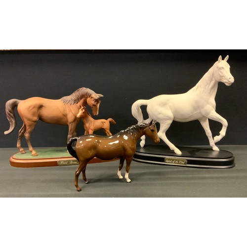 338 - A Royal Doulton model Horse, First Born, matt, plinth base, others Spirit of the Wind etc (3)