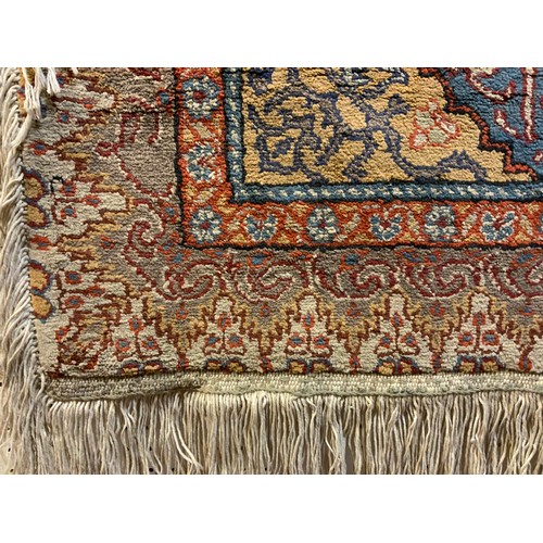 82 - An early 20th century Persian, Hamadan style rug, stylized floral-form medallion within a field of e... 