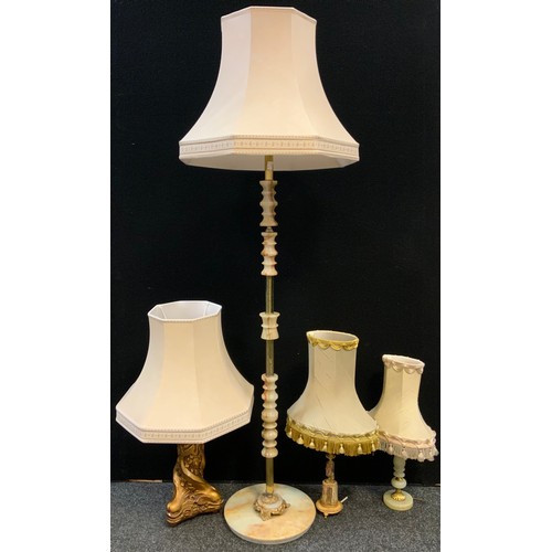 393 - An onyx and gilt metal standard lamp, sectional shaft, plain circular base, 130cm high;  other table... 