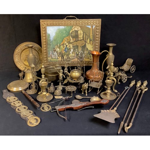 306 - Metalware - mostly brass, comprising fireside companion, vases, firescreen, various ornaments; etc