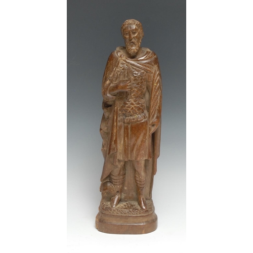 308 - A North European oak carving, of a male saint, 36cm high, 19th century