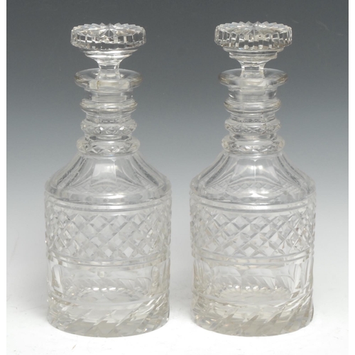 312 - A pair of 19th century cut glass mallet-shaped decanters, mushroom stoppers, 27.5cm high