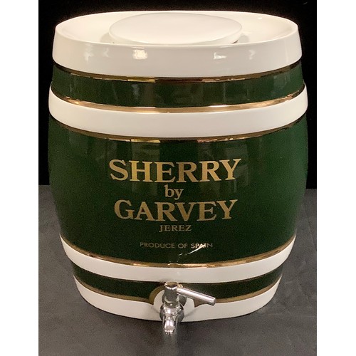 331 - An advertising Sherry barrel, Garvey Jerez, with cover and tap