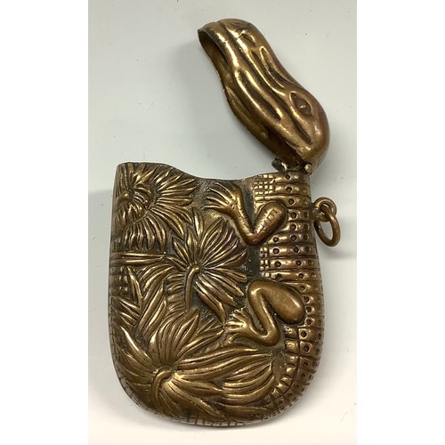 340 - A Japanese brass novelty vesta case, embossed with a crocodile, hinged cover, 6cm long, early 20th c... 