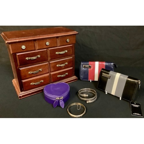 380 - A silver bangle; another, unmarked; an Osprey jewellery box; two Osprey purses; a wooden jewellery b... 