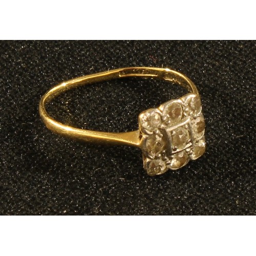 389 - A diamond ring, set square with nine diamond, gold shank, 2g