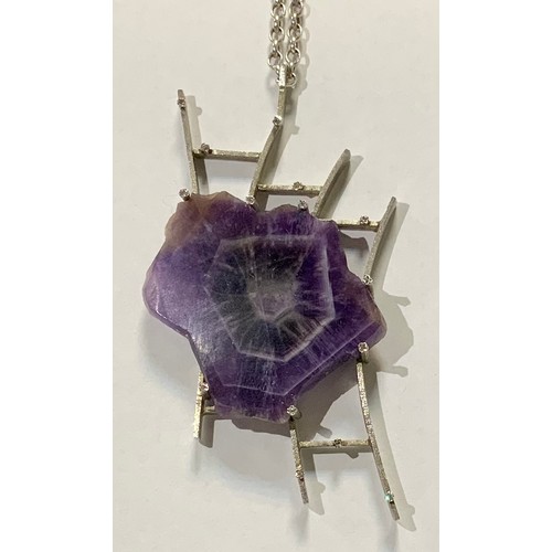 398 - An unusual diamond and amethyst pendant necklace, irregular free form slice of rough polished amethy... 