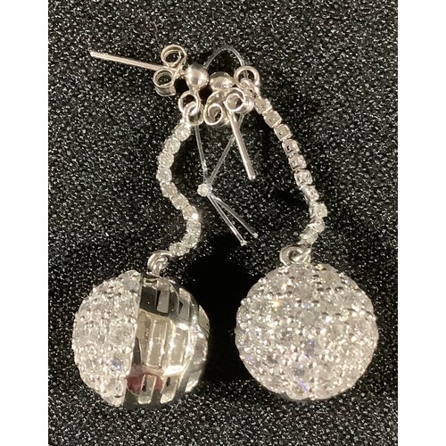 404 - A pair of silver and diamante globular earrings