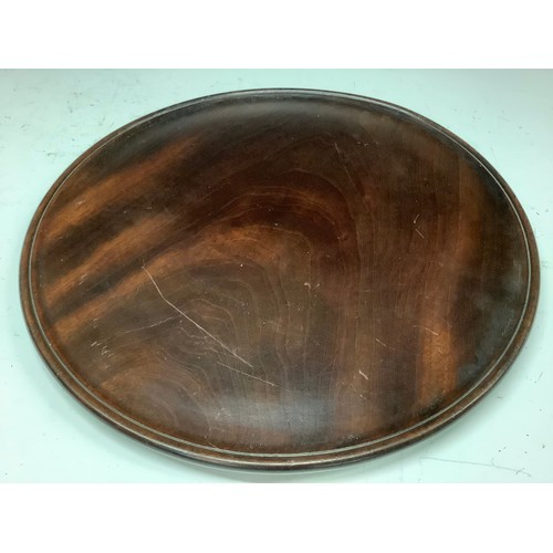 413 - A 19th century mahogany circular tray or waiter, 30cm diam