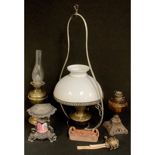 473 - Lighting - a 20th century ceiling oil lamp, Famos brass reservoir, milk glass shade, pierced holder,... 