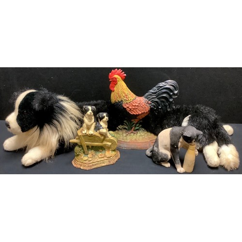 476 - A cast iron door stopper painted in bright colours, cockrel;  another collie dog pups; a resin model... 