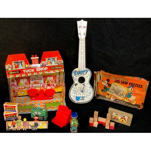 484 - Toys and Juvenalia - a 1960's Berwick Toys novelty foldout cardboard tuck shop with various miniatur... 