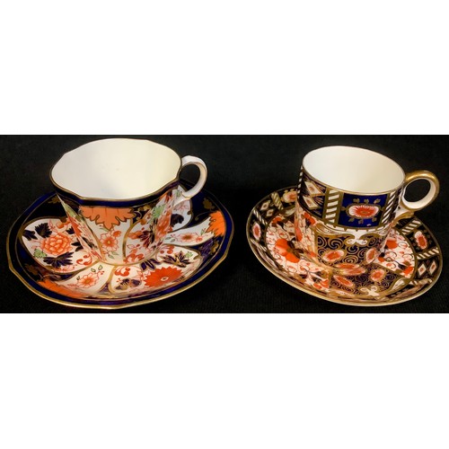 519 - A Royal Crown Derby cup and saucer, 6041 pattern; a Davenport Imari cup and saucer