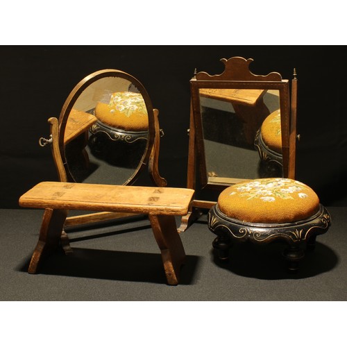 539 - A George III mahogany dressing glass, c.1800; another; a Victorian ebonised footstool, c.1880; a ver... 