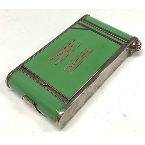 562 - An Art Deco camera shaped enamel compact and cigarette case