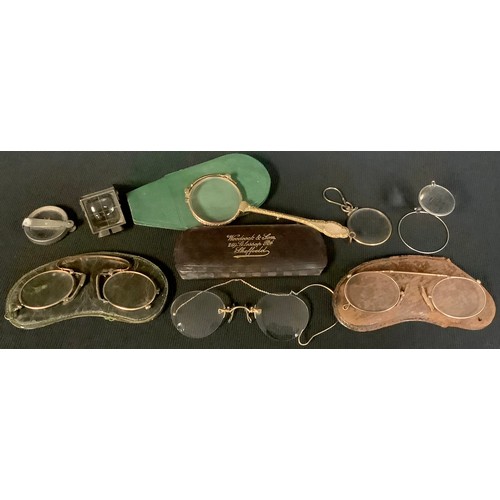 564 - Boxes and Objects - a gilt metal lorgnette; spectacles; lenses; etc, 19th century and later