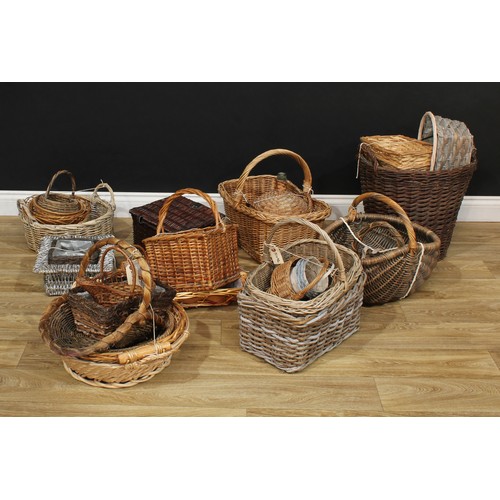 510 - Wicker Baskets - a collection of assorted baskets, bottles, paniers, picnic basket, etc; large qty