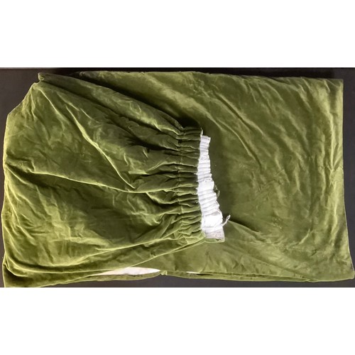 592 - Textiles - a single large green velvet curtain, interlined