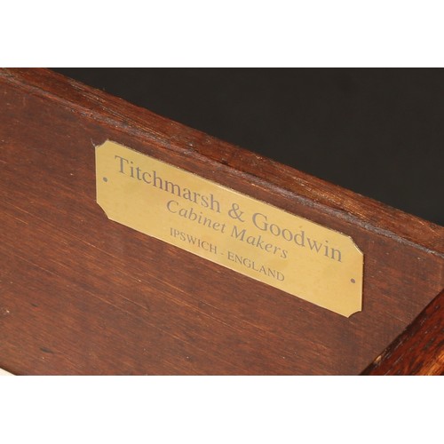 102 - A Titchmarsh & Goodwin oak dresser, moulded cornice above a pair of plate racks, the lower flanked b... 