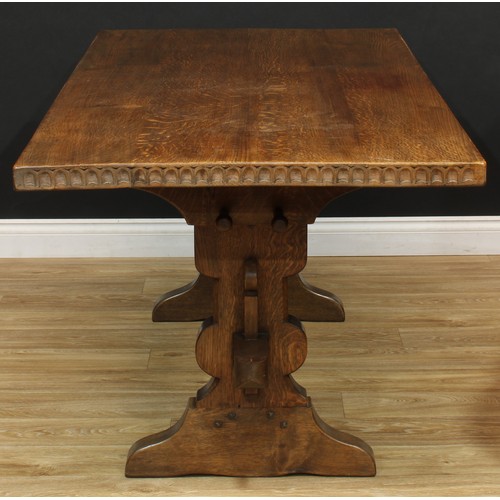 105 - An oak refectory trestle dining table, probably Rupert or Nigel Griffiths Monastic Woodcraft, rectan... 