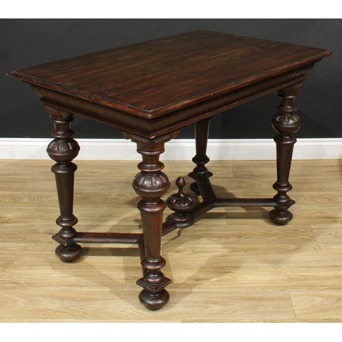 109 - A Spanish Baroque style oak serving table, rectangular top with moulded edge, turned supports, forke... 