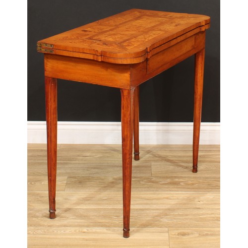 116 - An unusual oak and pollard oak tea table, hipped rectangular top above a single frieze drawer, taper... 