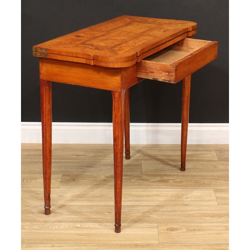 116 - An unusual oak and pollard oak tea table, hipped rectangular top above a single frieze drawer, taper... 