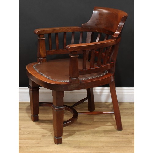 209 - An early 20th century mahogany desk chair, curved cresting rail, studded stuffed-over seat, Crinolin... 