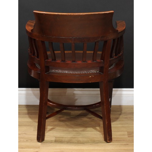 209 - An early 20th century mahogany desk chair, curved cresting rail, studded stuffed-over seat, Crinolin... 