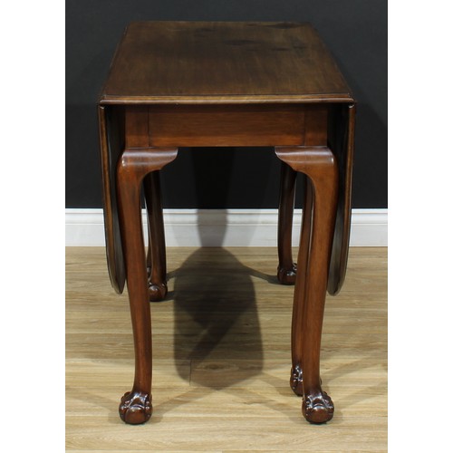 210 - A mahogany gateleg dining table, rounded rectangular top with fall leaves, cabriole legs, ball and c... 