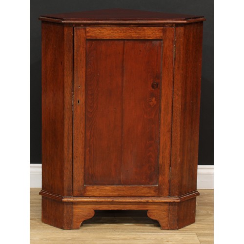 542 - A Sheraton inspired satinwood banded mahogany wall hanging splay front corner cupboard, of small pro... 