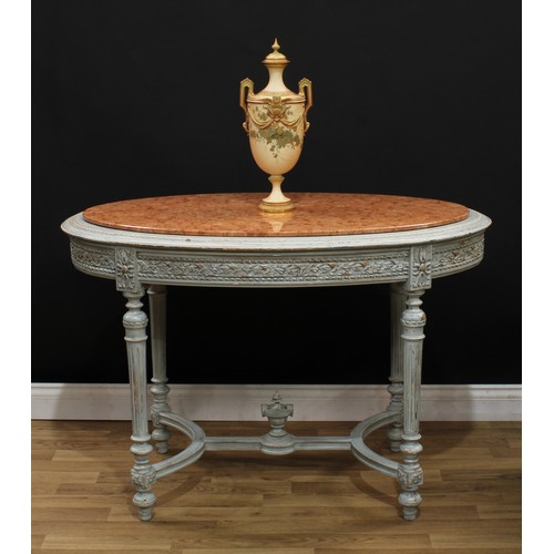 545 - A Louis XVI Revival painted softwood oval centre table, marble top above a deep frieze carved with r... 