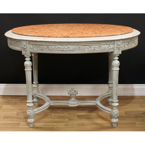 545 - A Louis XVI Revival painted softwood oval centre table, marble top above a deep frieze carved with r... 