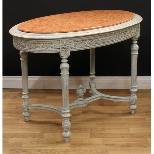 545 - A Louis XVI Revival painted softwood oval centre table, marble top above a deep frieze carved with r... 