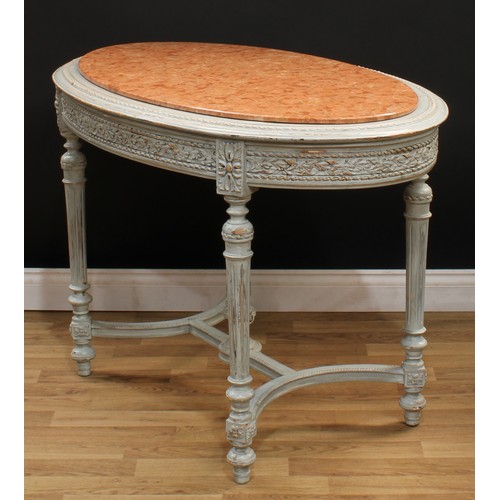 545 - A Louis XVI Revival painted softwood oval centre table, marble top above a deep frieze carved with r... 