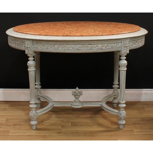 545 - A Louis XVI Revival painted softwood oval centre table, marble top above a deep frieze carved with r... 