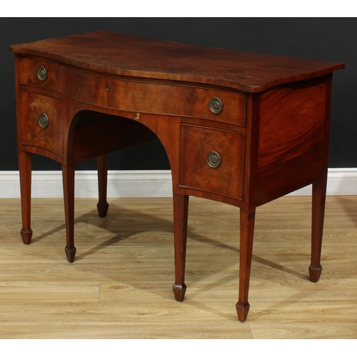 550 - A 19th century mahogany serpentine serving table, slightly oversailing top above one long and two sh... 