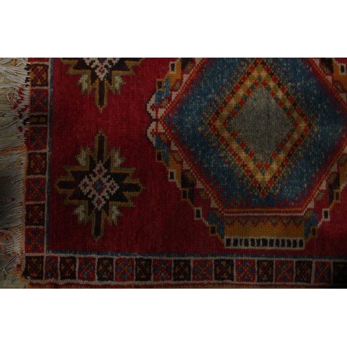 627 - A Middle Eastern Chobi type rug or carpet, 180cm x 126cm; others, similar, 163cm x 70cm and 100cm x ... 