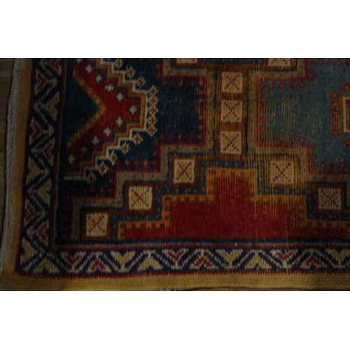 627 - A Middle Eastern Chobi type rug or carpet, 180cm x 126cm; others, similar, 163cm x 70cm and 100cm x ... 