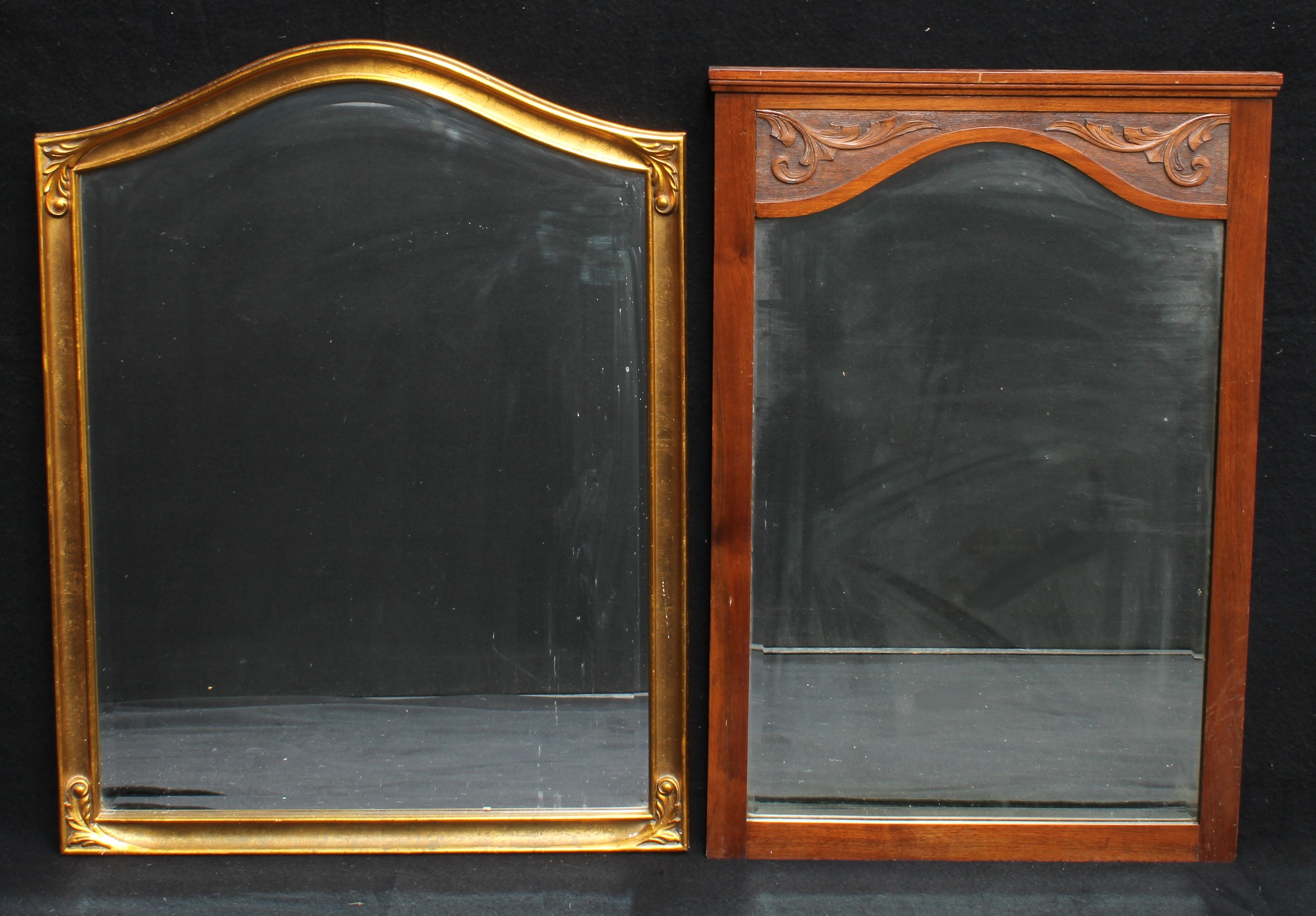 An Edwardian mahogany mirror, carved frame, bevelled glass, ...
