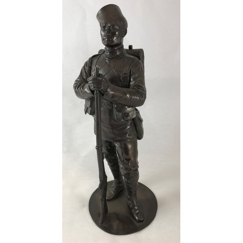 318 - Military  Interest - English School, early 20th century, a 'bronzed' figure of a Gurka soldier, stan... 