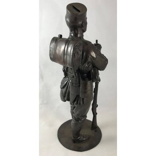 318 - Military  Interest - English School, early 20th century, a 'bronzed' figure of a Gurka soldier, stan... 