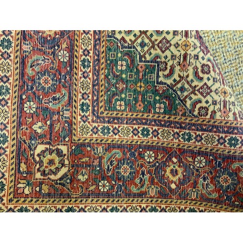 180 - A Persian fine Tabriz woollen carpet, 210cm x 131cm