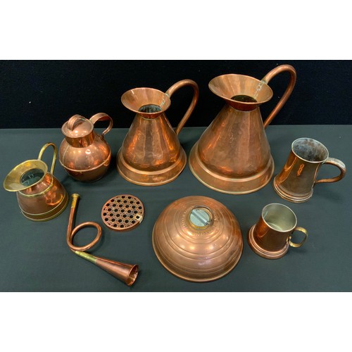 201 - Copper - two copper haystack jugs;  Jersey jug;   hunting horn;  mus, etc