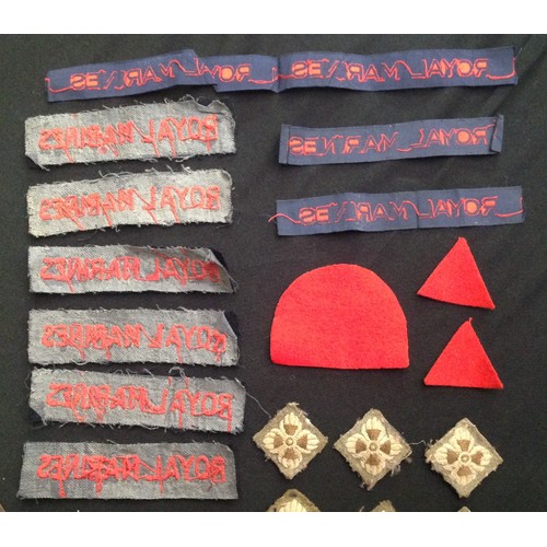 101 - WW2 British Royal Marines cloth shoulder titles in both embroidered and machine woven form: cloth an... 